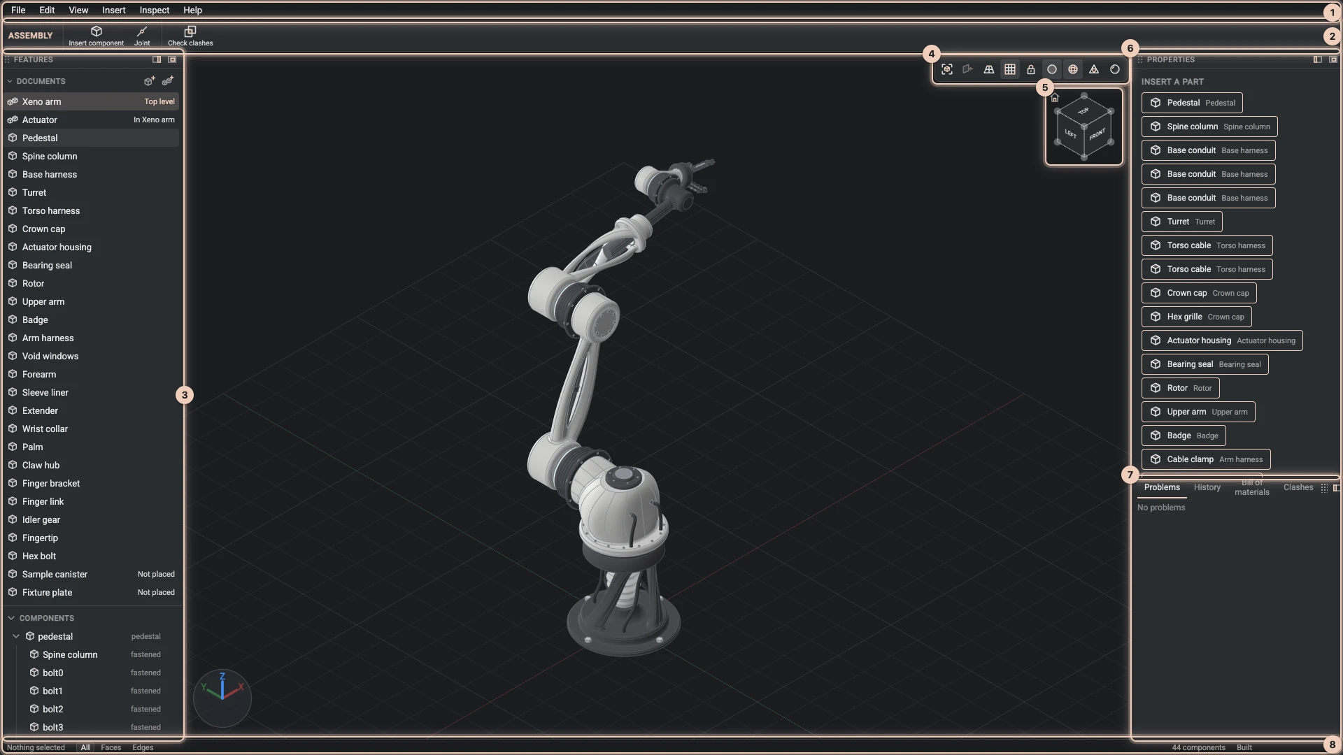 The Designer with the robot arm open: menus and toolbar along the top, the Features panel on the left, the view in the middle with its view bar and cube, Properties and the dock on the right, the status bar along the bottom